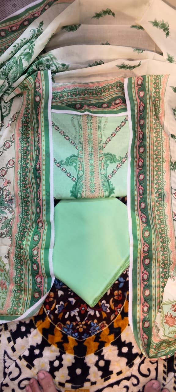 03-piece gold  Unstitched  light pariot  print lawn suit